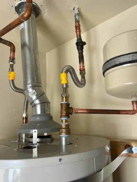 Water heater installation and plumbing repair in Chisolms